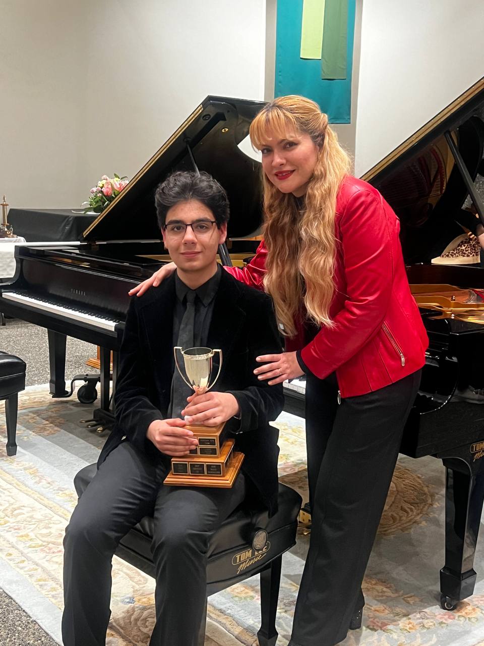 Mahan and Siranoush with trophy